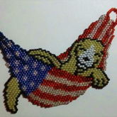 Golden Retriever In An American Flag Hammock