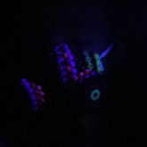 Kandi Gas Mask Under Blacklight