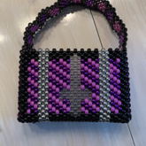 Purple Bag With Upside Down Cross