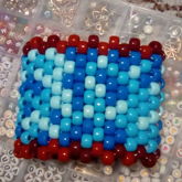 Multiple Colors Of Blue And Red Multi Stitch Cuff 