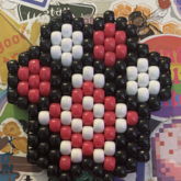 Pink, White, And Black Star Paw Charm