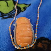 Rung-themed Pill Bug Necklace