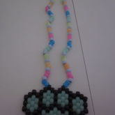 Green Glow In The Dark And Black Br*** Knuckles Glow In The Dark Necklace