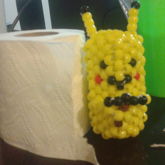 Pikachu Beside Toilet Paper