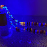 Take A Chill Pill Necklace Under A Blacklight 