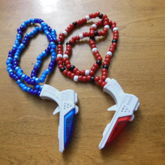 Blue & Red Laser Gun Necklaces