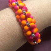 A Thin Cuff Of Orange, Pink & A Touch Of Silver