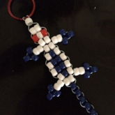 Red Eyed, White And Dark Blue Key Chain Lizard.