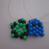 Green And Black Star And Blue Pacman Ghost Necklaces 