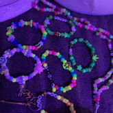 Kandi Bracelets And A Necklace