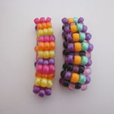 Purple, Yellow, And Pink And Purple, Green, Orange, And Black Ladder Cuffs 