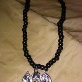Skull With Bat Wings Necklace