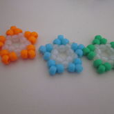 Orange, Blue, Green, And Clear Glow In The Dark Center Stars 