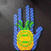 REZZ X Pineapple Perler Hand